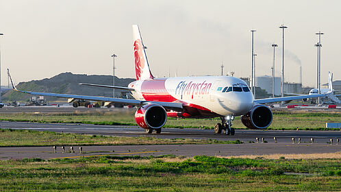 FlyArystan aircraft photo 3